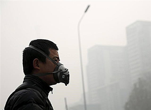 Beijing vle dispèse smog ak fanatik nan lari yo